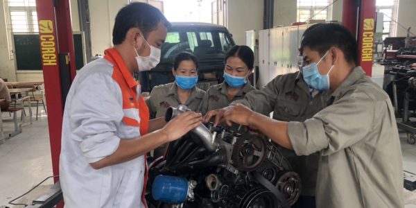 Students in practical session at Automotive repair class