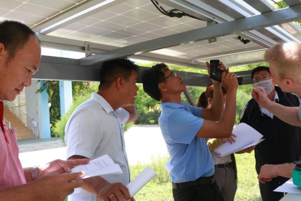The teachers practice on measuring temperature of the PV panels by Infrared thermometer