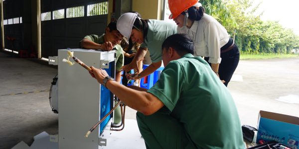 The teachers were connecting the copper pipes with indoor unit