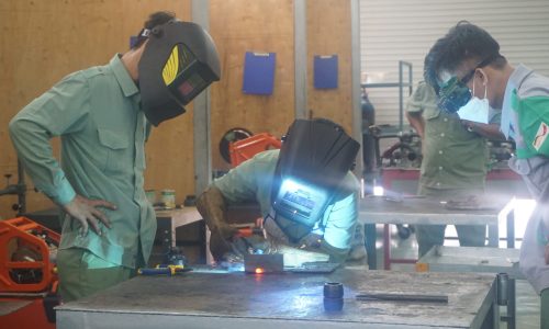 Participating teachers were welding on MIG machine