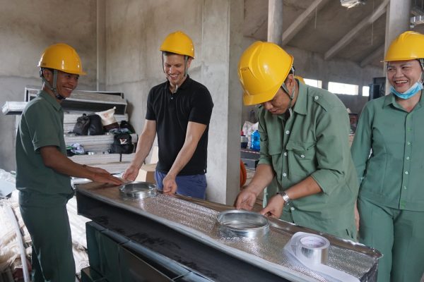 Teachers were installing the insulation of air ducts