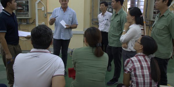 The trainer and participants were discussing the role-played session