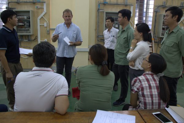 The trainer and participants were discussing the role-played session