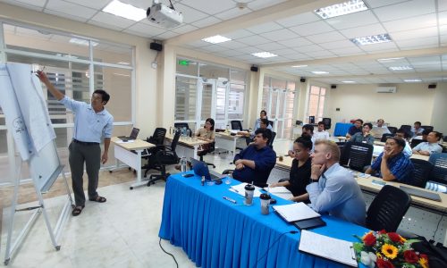 Mr. Nguyen Xuan – Dean of Mechanical-Construction is presenting the Organization Chart of his department.