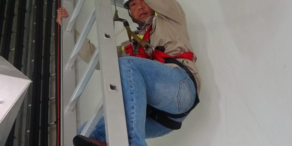 NTVC teacher on his first steps up to the nacelle by the climb assist.
