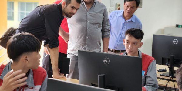 GIZ Development Advisors visit a computer lab