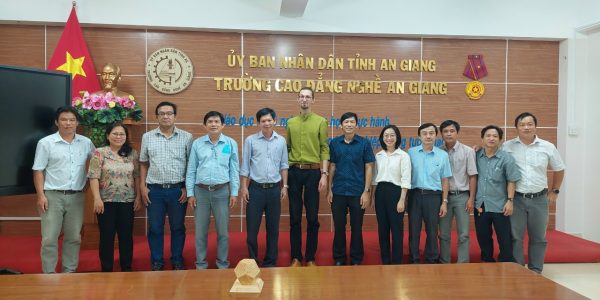 GIZ development advisor and AGVC’s managers and teachers took group photo at end of survey