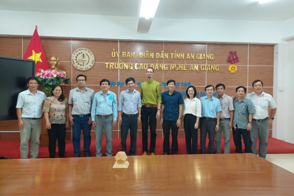 GIZ development advisor and AGVC’s managers and teachers took group photo at end of survey