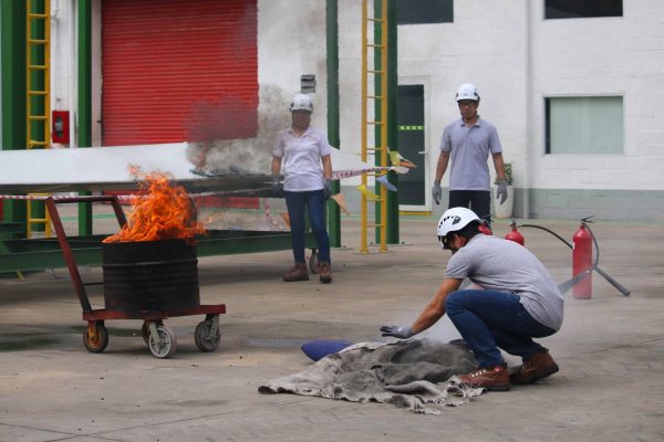 NTVC teachers practices the efficient and safe use of CO2 extinguishers and fire blankets.