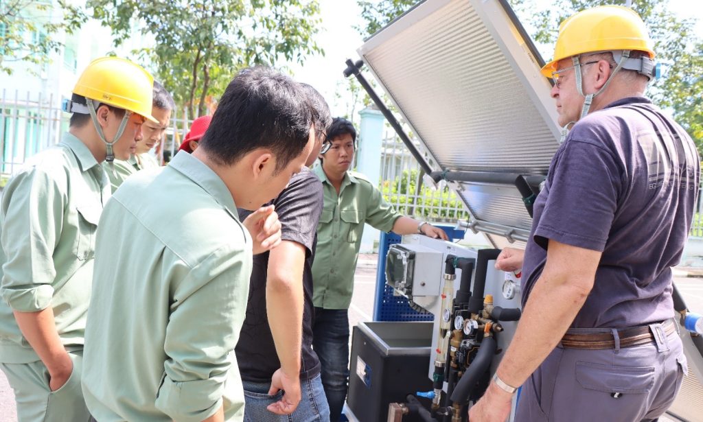 The trainer was showing the components and functions of heating domestic water system by solar energy