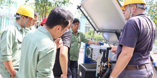 The trainer was showing the components and functions of heating domestic water system by solar energy