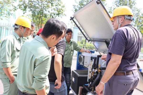 The trainer was showing the components and functions of heating domestic water system by solar energy